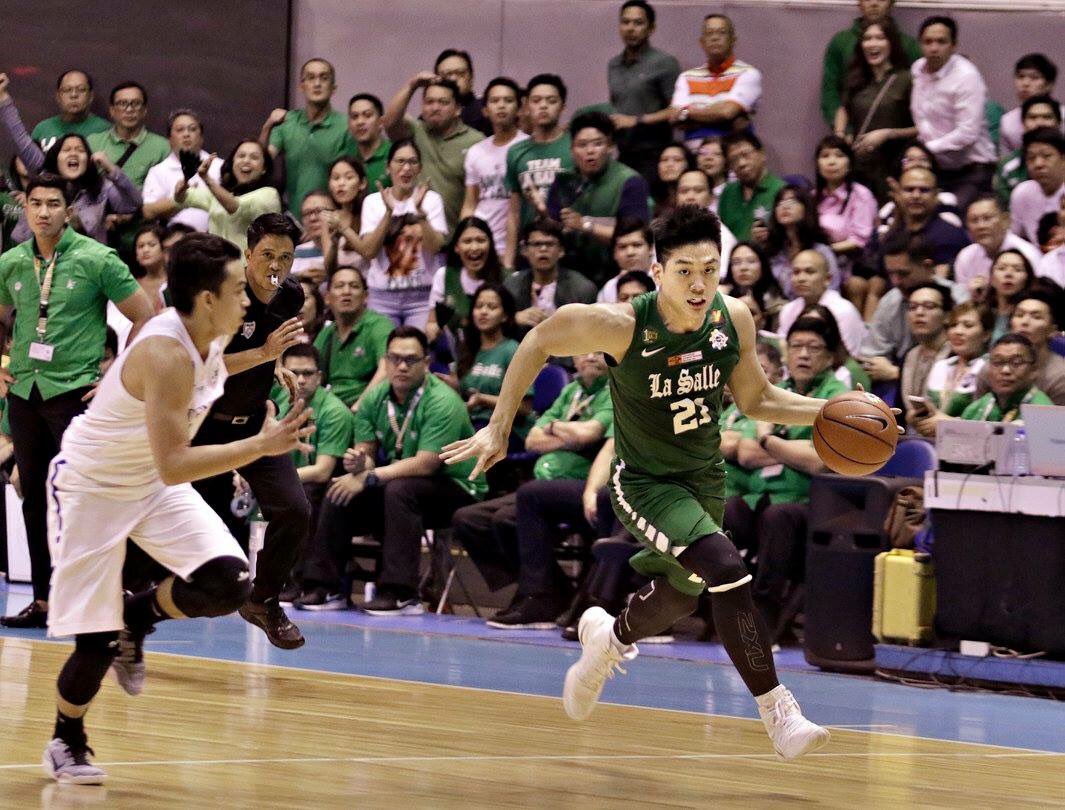 jeron teng of green archers going for a basket in their game wednesday December 07, 2016